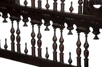 A Gothic Revival Walnut Four Poster Bed