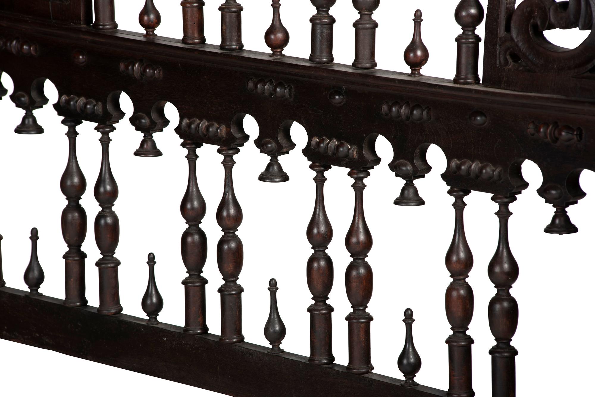 A Gothic Revival Walnut Four Poster Bed