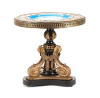 A Napoleon III Porcelain Mounted Gilt Bronze Gueridon Height 30 1/2 x diameter of top 31 3/4 inches. — LATE 19TH CENTURY