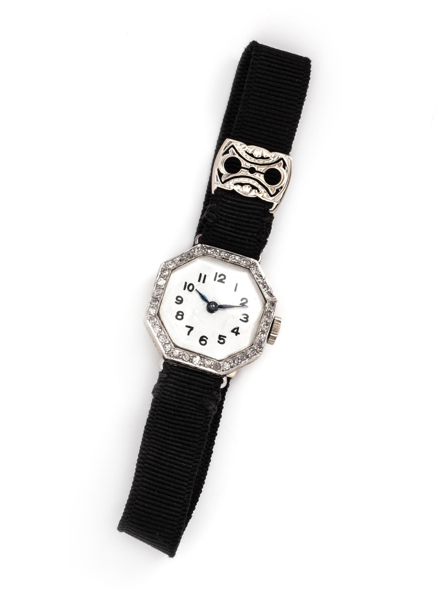 A Platinum, Yellow Gold and Diamond Wristwatch,