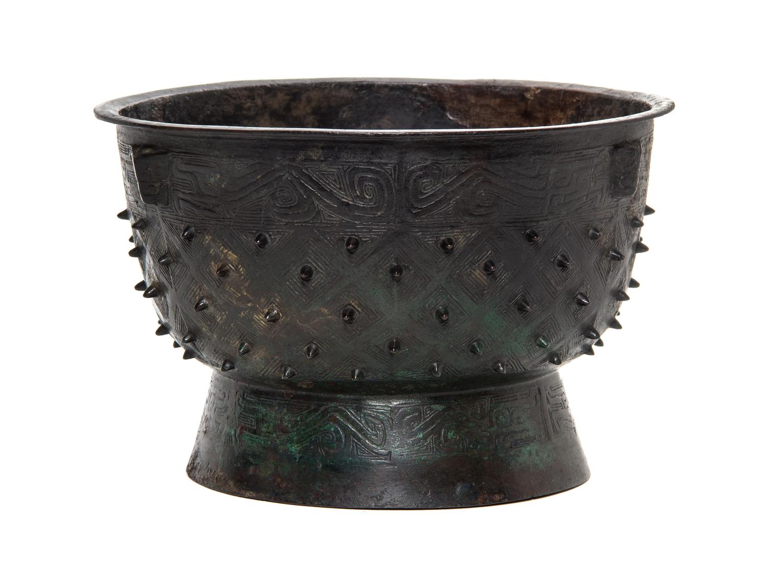 A Bronze Yu Ritual Food Vessel Height 6 1/4 x diameter 9 3/4 inches.