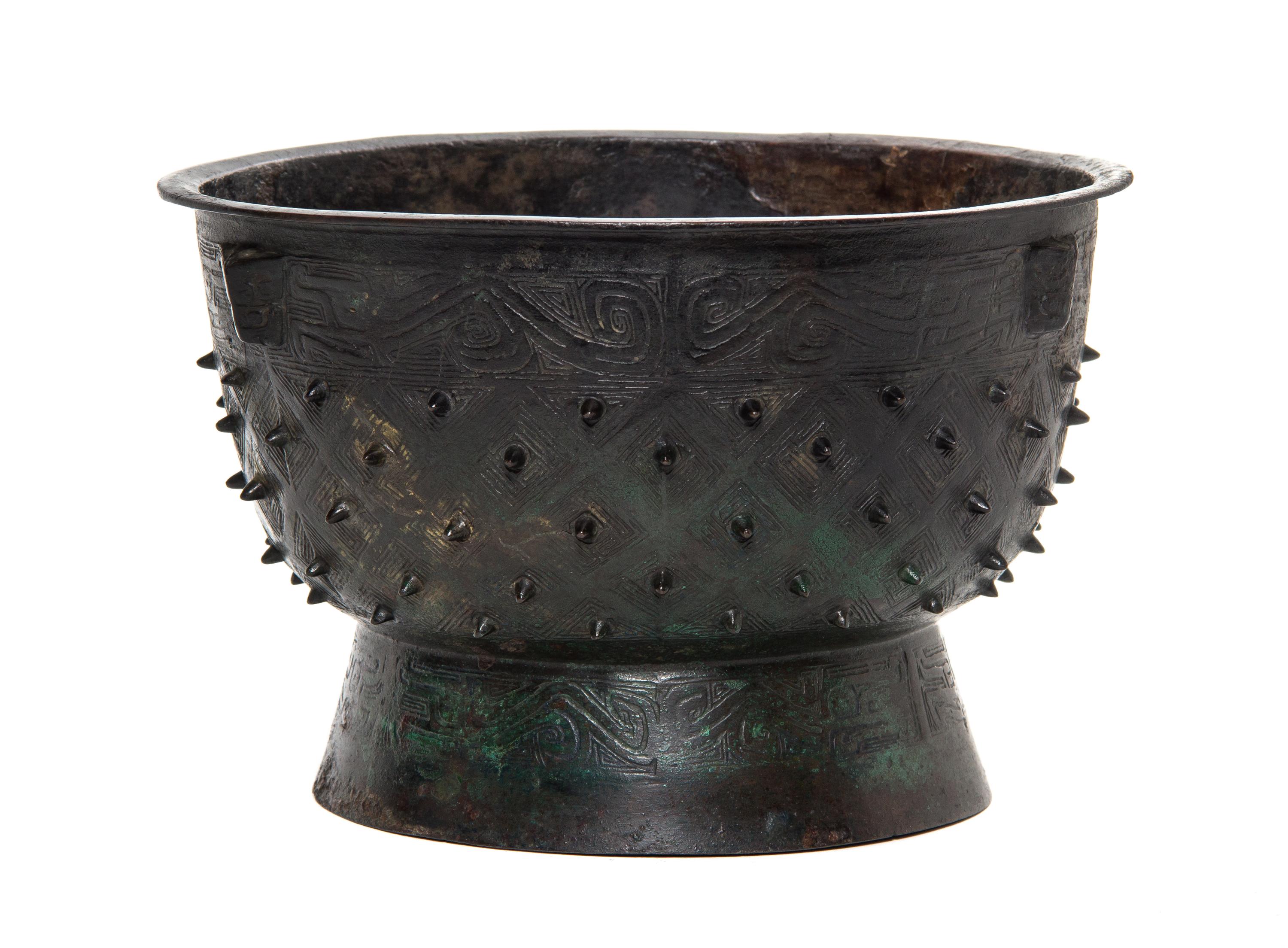 A Bronze Yu Ritual Food Vessel Height 6 1/4 x diameter 9 3/4 inches.