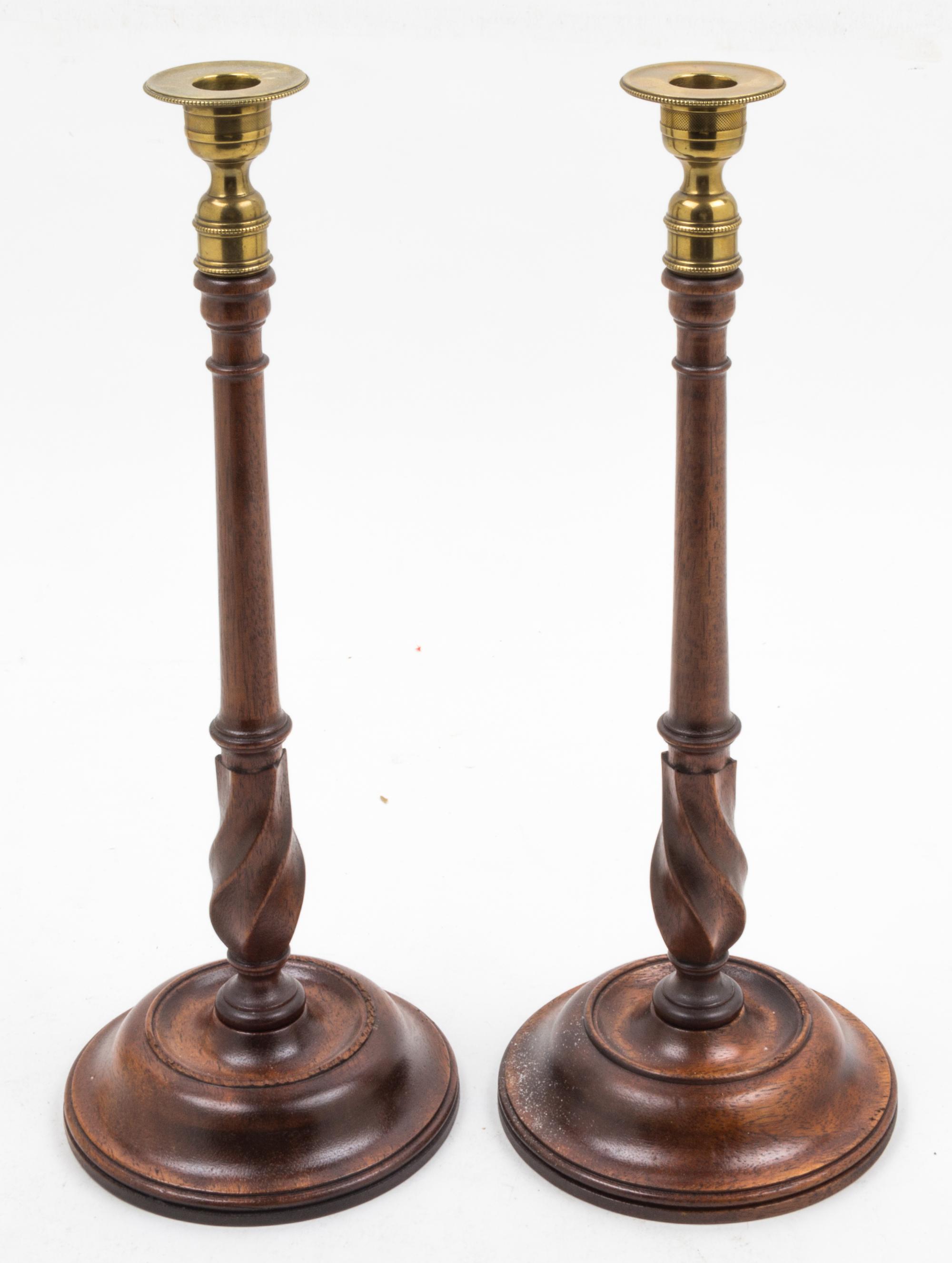 A Pair of Victorian Turned Wood Candlesticks Height 15 inches.