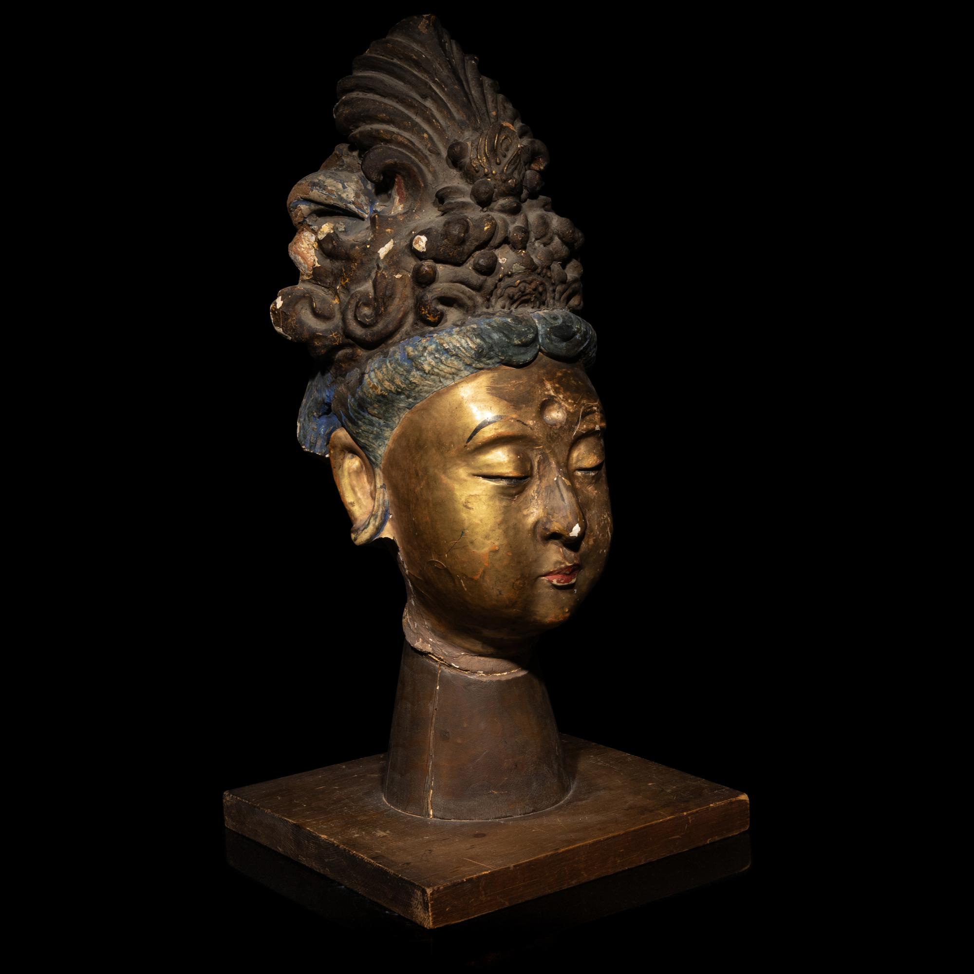 A Chinese Polychrome Painted Stucco Head of a Female Attendant, Song-Ming Dynasty 宋-明 彩繪泥塑侍女頭像