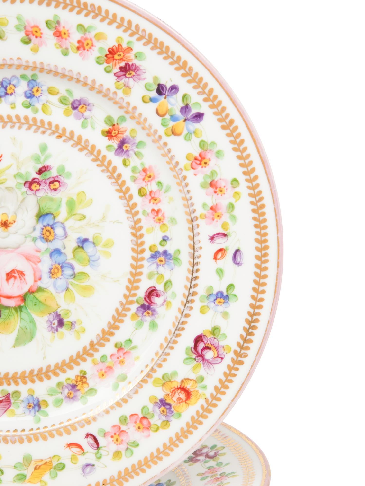 A Set of Twelve French Porcelain Cabinet Plates