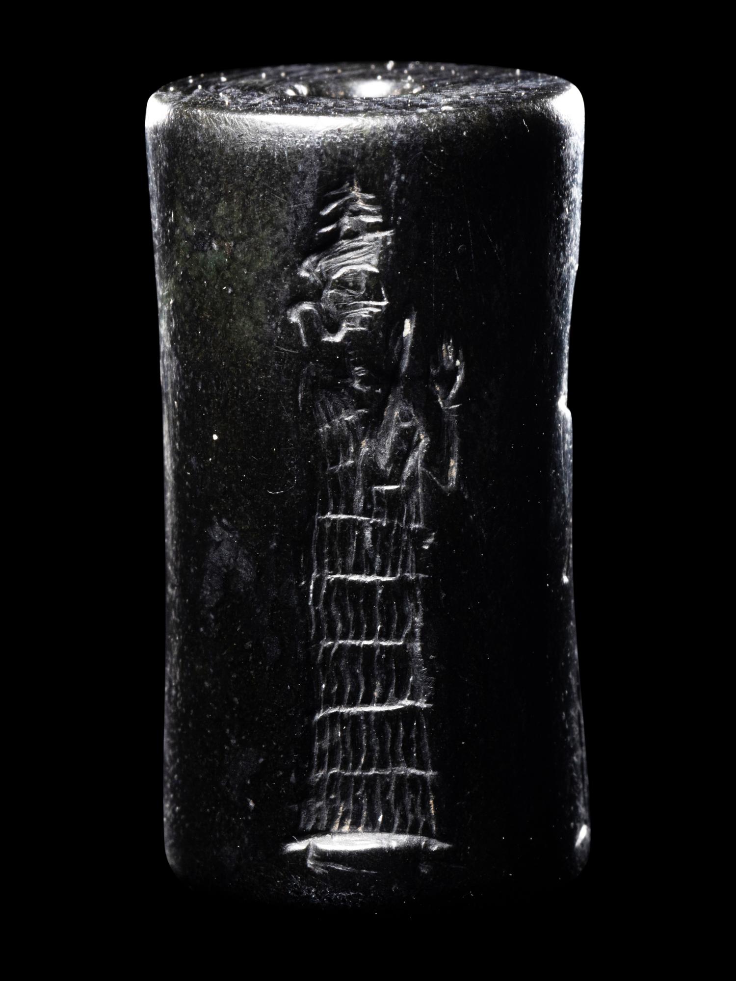 A Mesopotamian Hematite Cylinder Seal