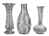 A Group of Silver and Silver-Plate Bud Vases, , comprising an example from the Louis Comfort Tiffany Collection, Tiffany & Co., New Yor