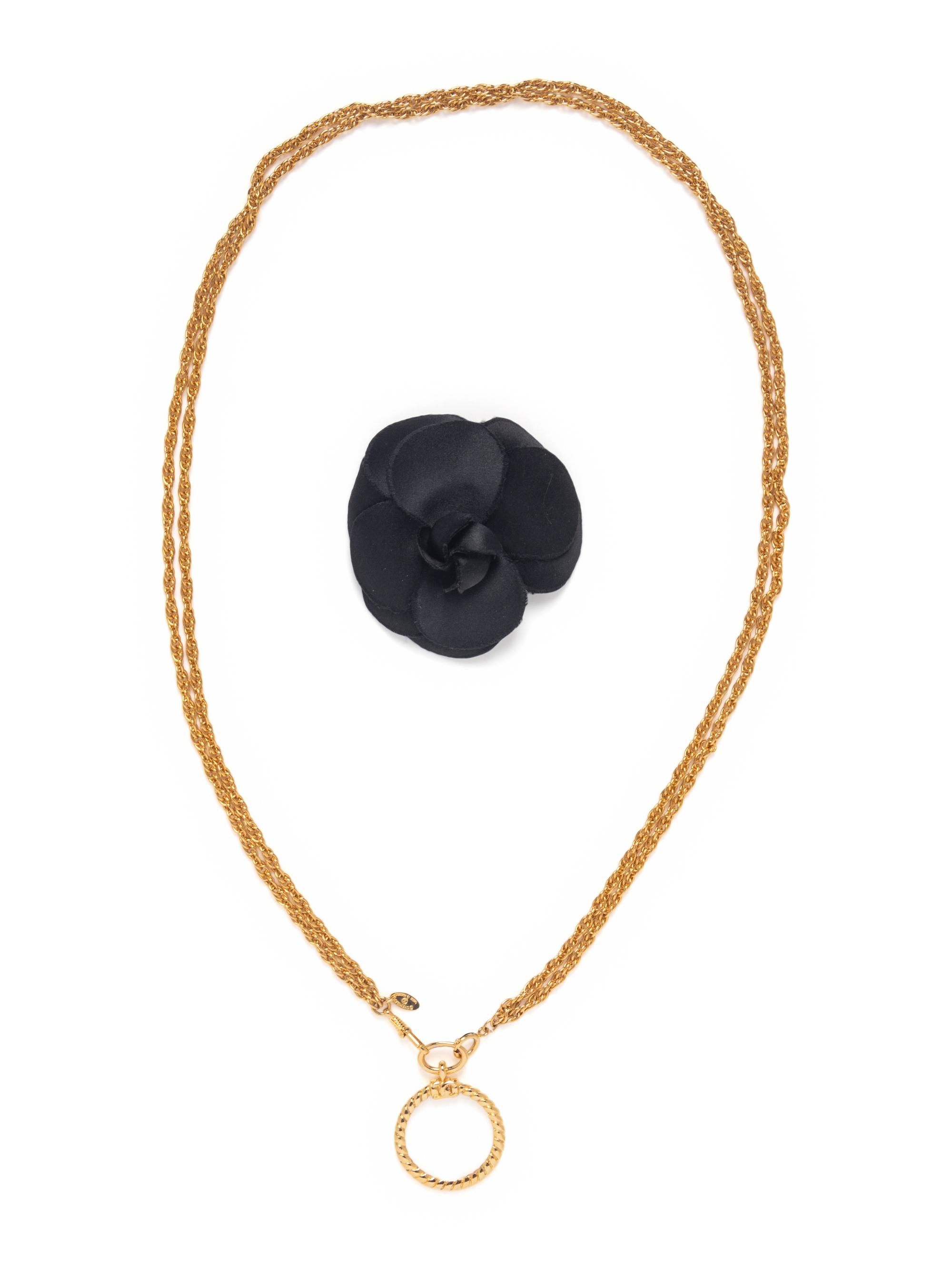 Chanel Magnifying Glass Necklace & Camellia