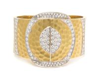 An 18 Karat Bicolor Gold and Diamond Bracelet, 69.00 dwts.