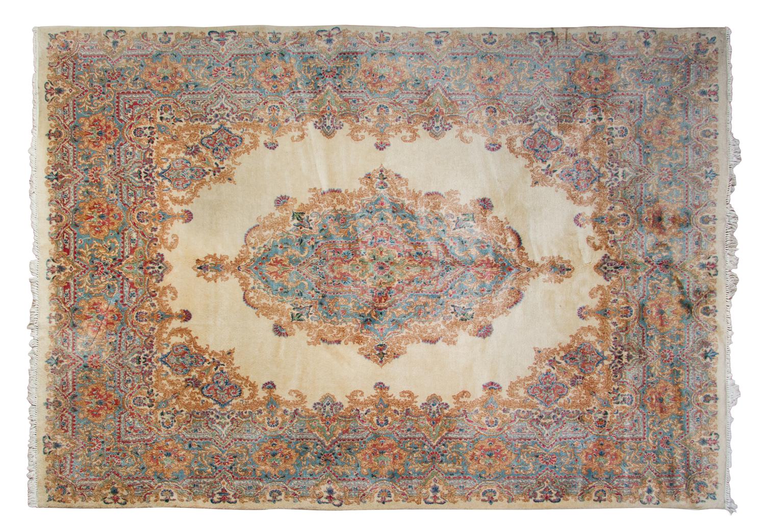 A Kirman Wool Rug 10 feet 8 inches x 7 feet 6 inches. — MID-20TH CENTURY
