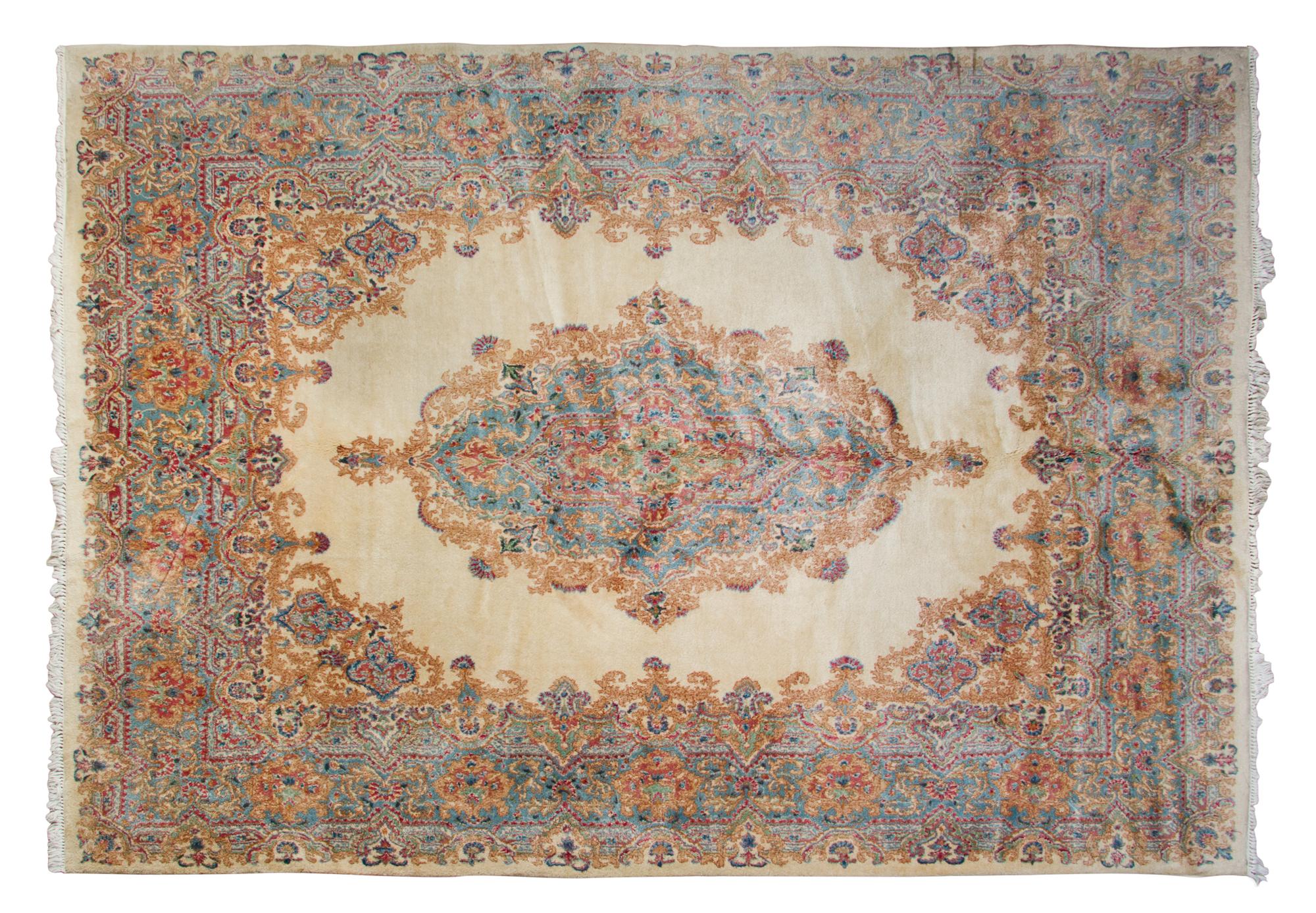 A Kirman Wool Rug 10 feet 8 inches x 7 feet 6 inches. — MID-20TH CENTURY
