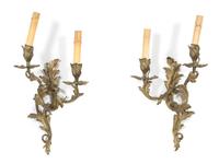 A Pair of Louis XV Style Gilt Bronze Two-Light Wall Sconces Height 17 x width 9 1/2 x depth 6 inches. — 19TH CENTURY