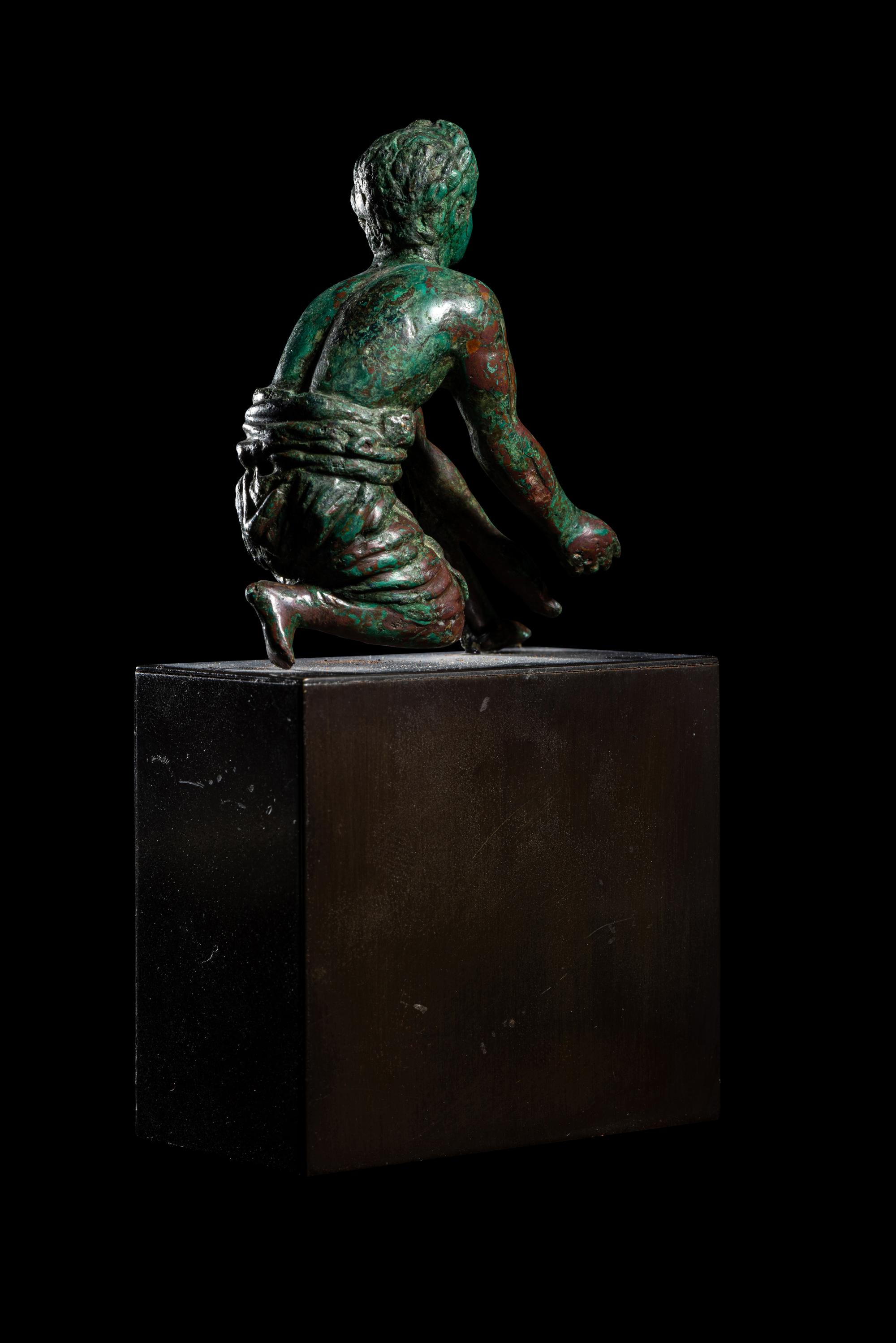 A Roman Bronze Kneeling Priest