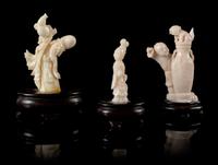 Three Carved White Coral Figures Height of tallest 3 3/4 inches.
