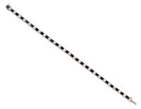 An Art Deco Platinum, Diamond and Onyx Line Bracelet, Boucheron, 8.60 dwts.