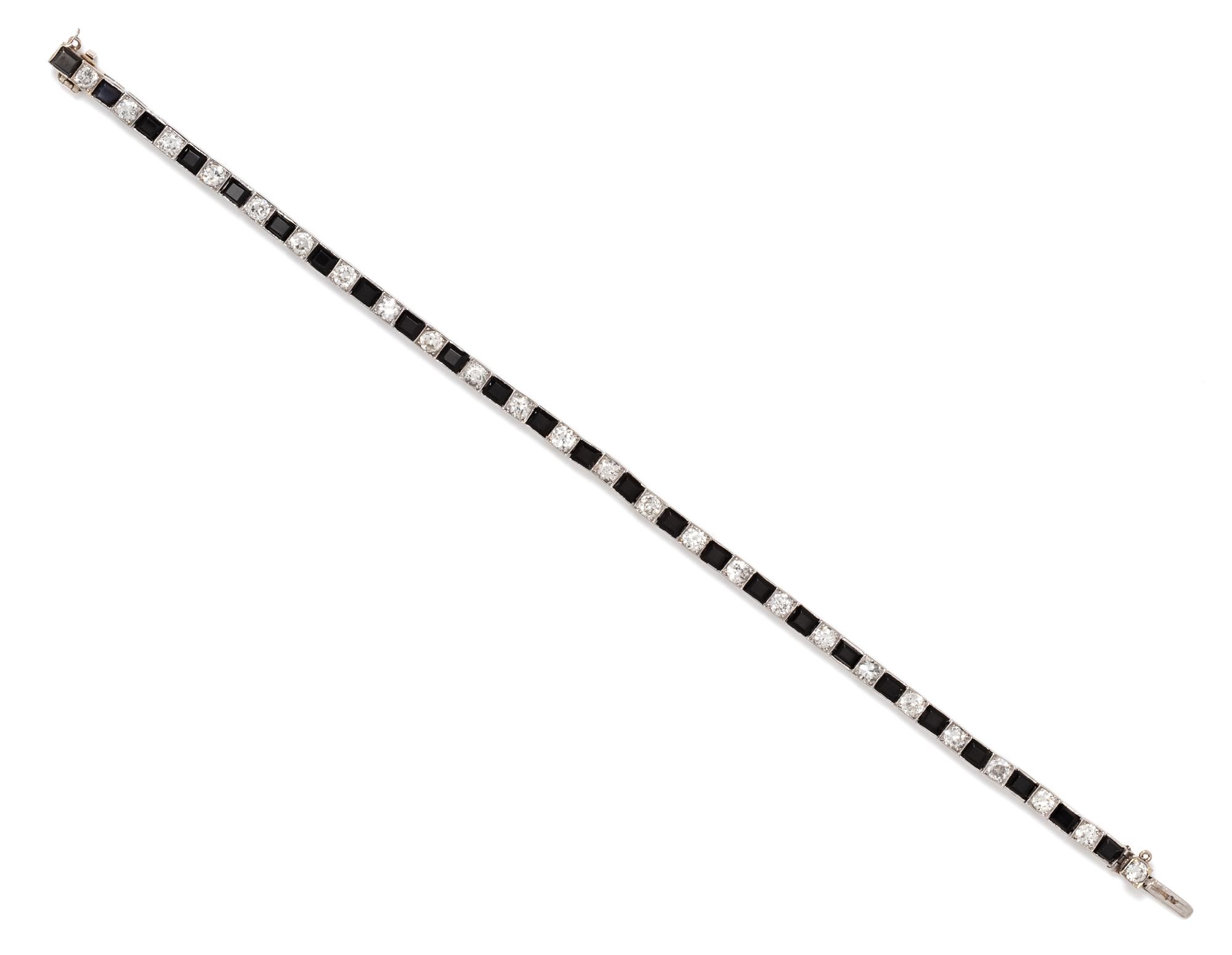 An Art Deco Platinum, Diamond and Onyx Line Bracelet, Boucheron, 8.60 dwts.