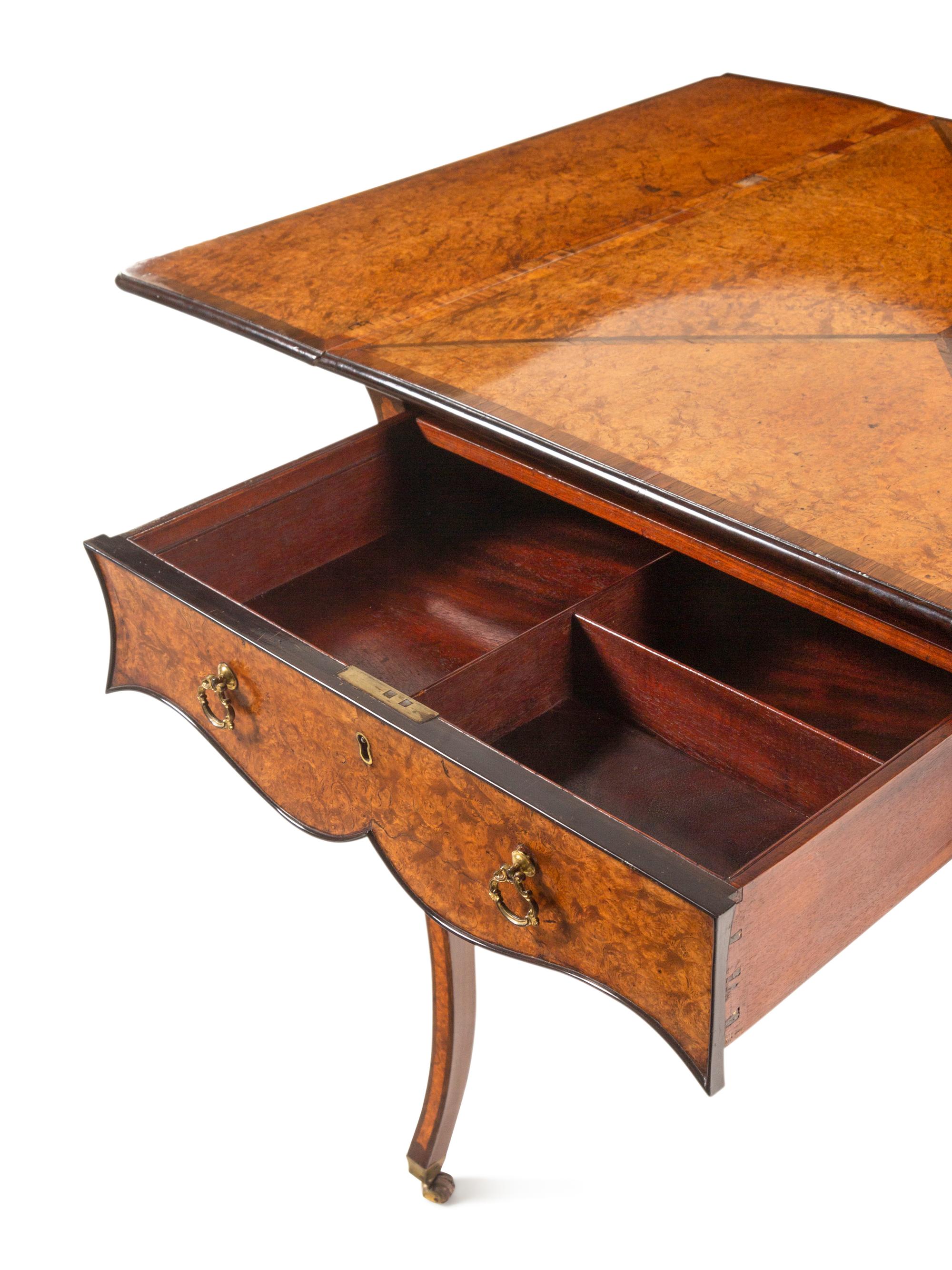 A George III Mahogany, Padouk and Amboyna Pembroke Table