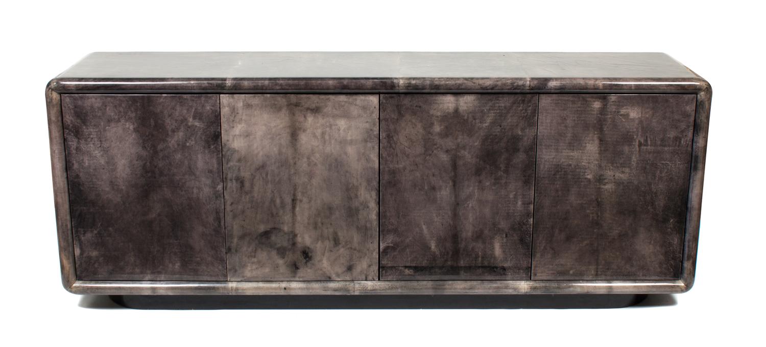 An American Sideboard Height 31 1/2 x width 80 1/2 x depth 17 3/4 inches — ALDO TURA, CIRCA 1960