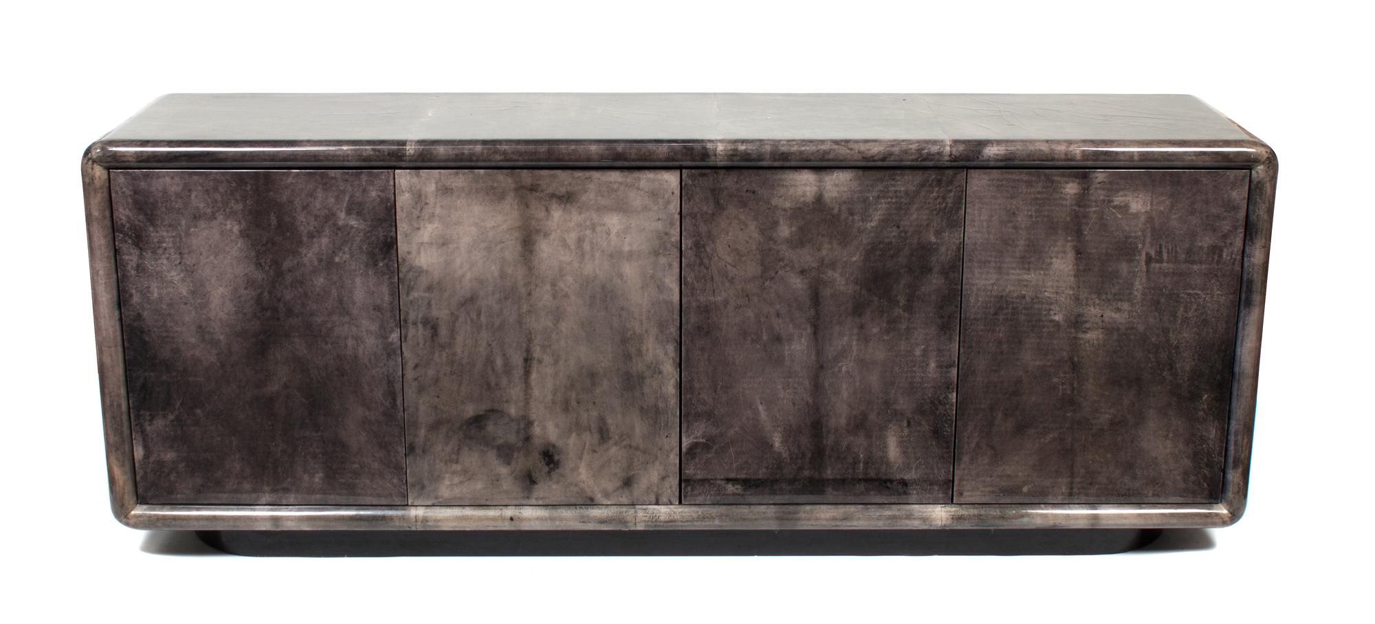 An American Sideboard Height 31 1/2 x width 80 1/2 x depth 17 3/4 inches — ALDO TURA, CIRCA 1960