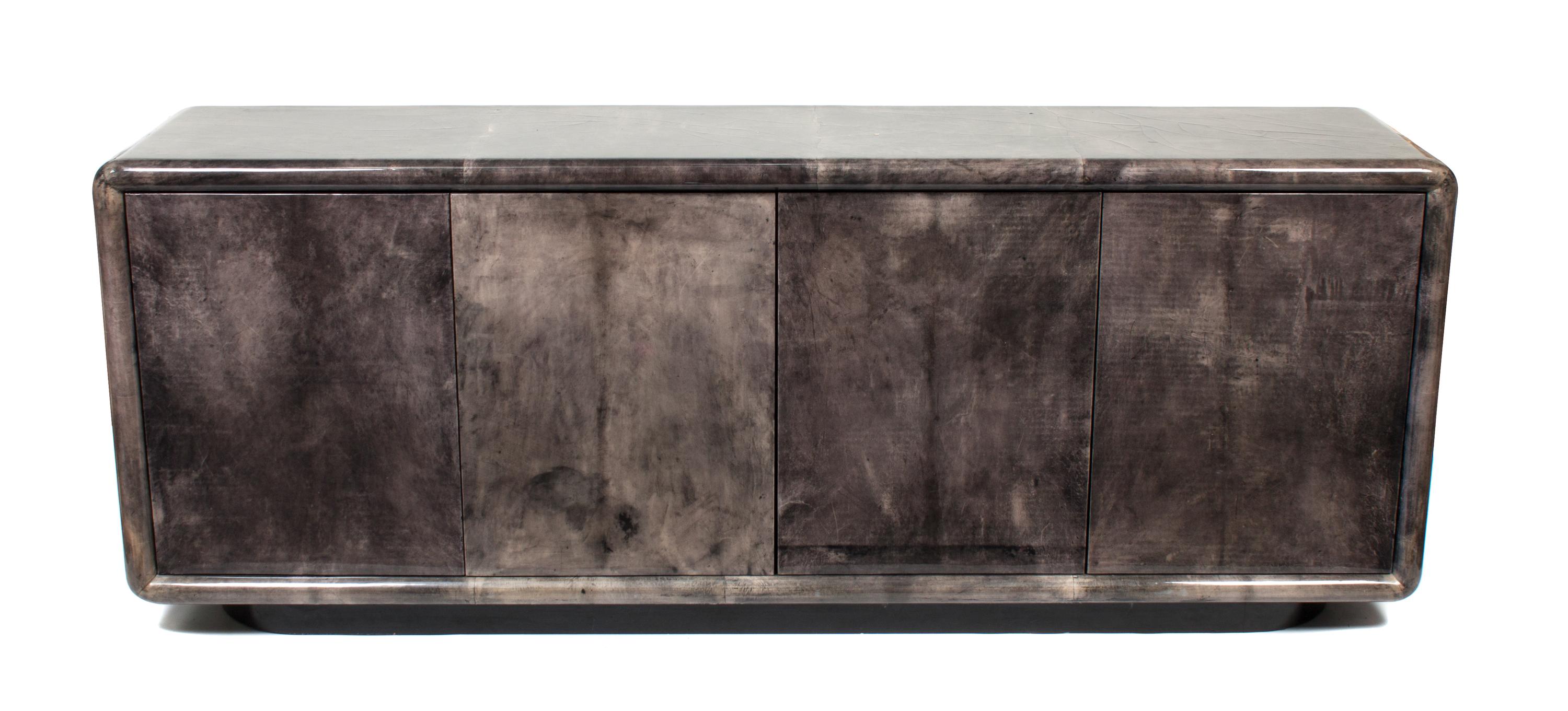 An American Sideboard Height 31 1/2 x width 80 1/2 x depth 17 3/4 inches — ALDO TURA, CIRCA 1960