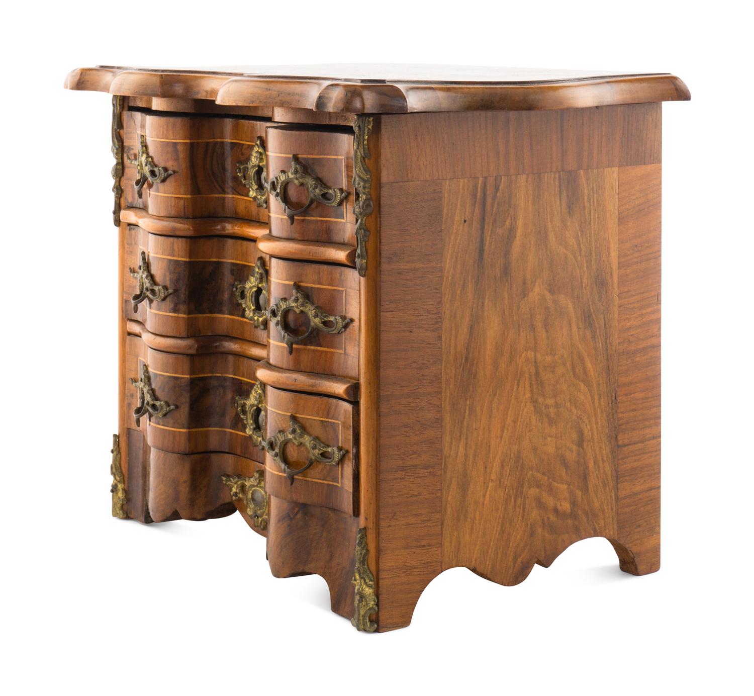 A Louis XV Style Walnut and Kingwood Diminutive Chest of Drawers