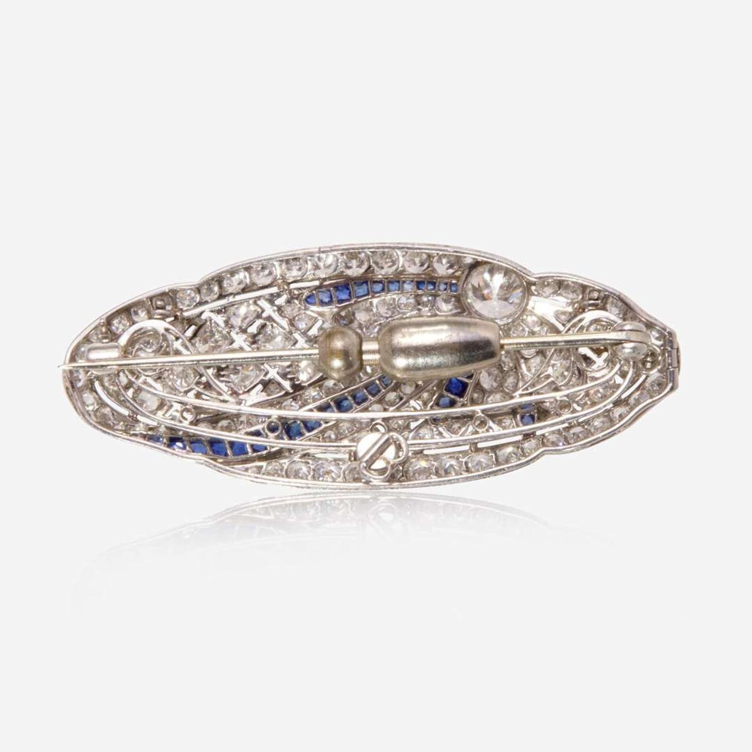 A Platinum, Diamond, and Sapphire Brooch