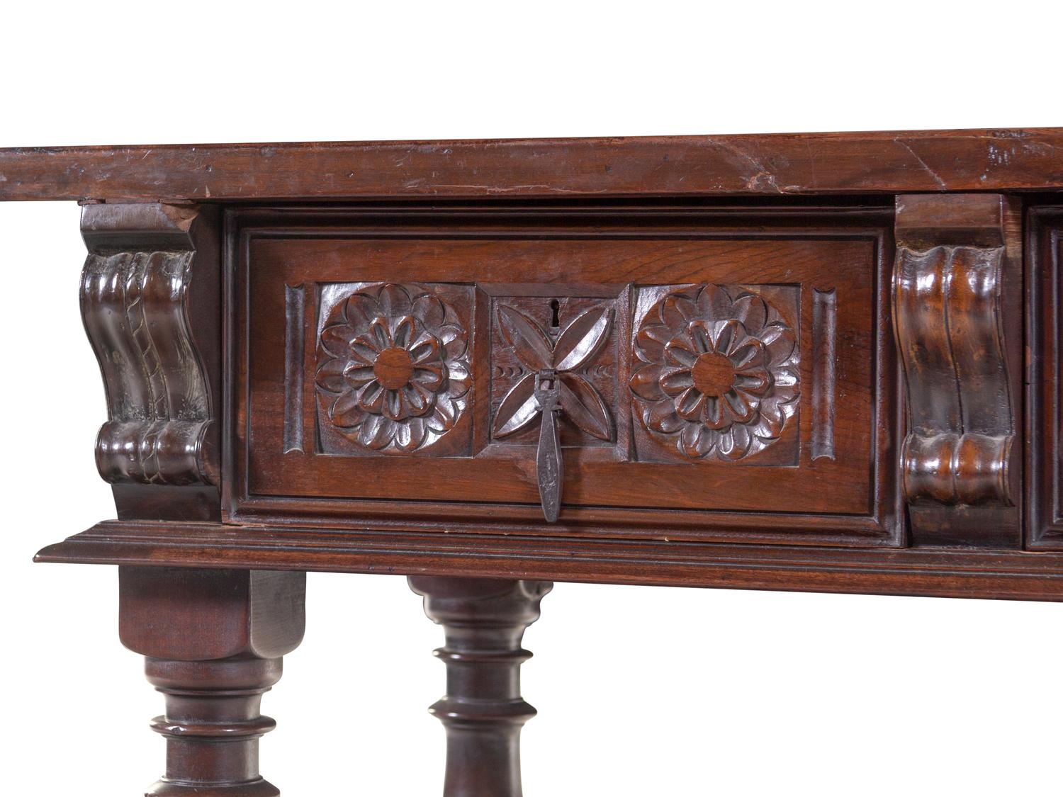 A Spanish or Italian Baroque Style Walnut Sideboard