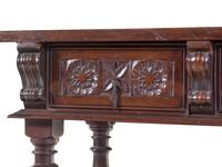 A Spanish or Italian Baroque Style Walnut Sideboard