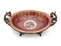 A Haviland Gilt Metal Mounted Porcelain Coupe
