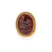 A Neoclassical Gold and Carnelian Brooch with Goddess Venus and Eros