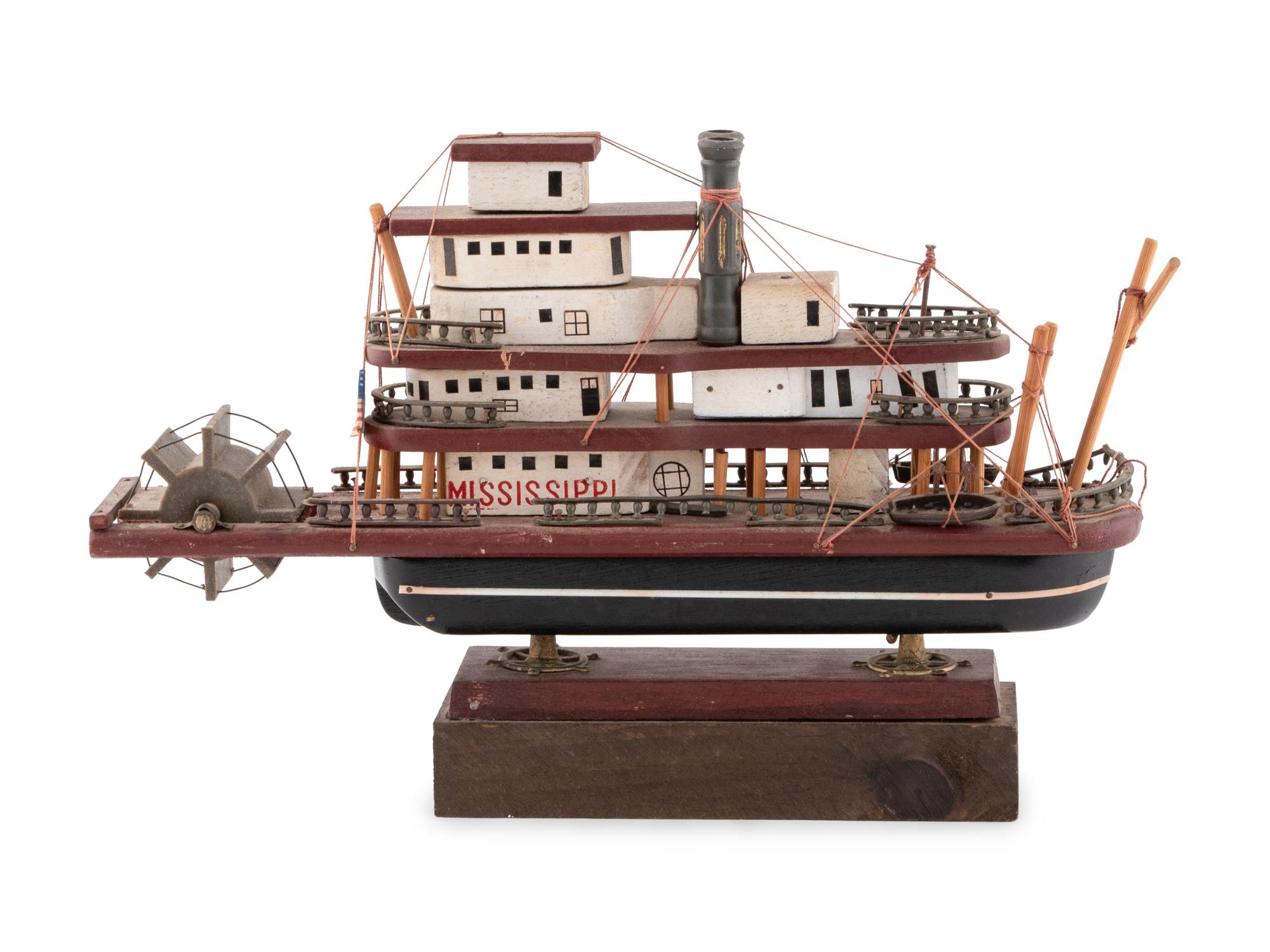 A Carved and Painted Wood Paddle Boat Model Mississippi