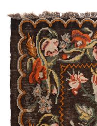 A Floral Flatweave Rug