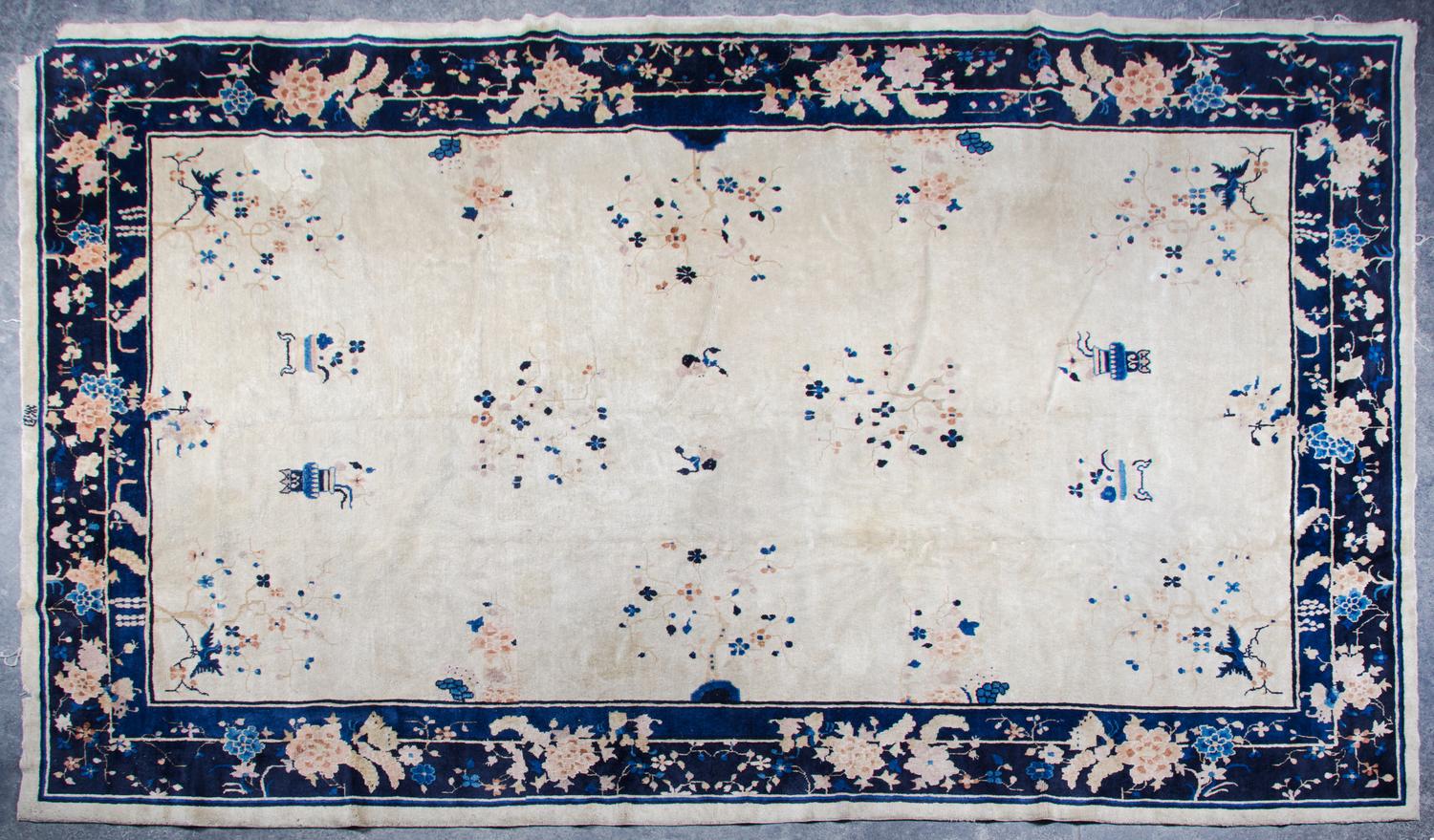 A Chinese Wool Rug 11 feet 2 inches x 8 feet 1 inch.