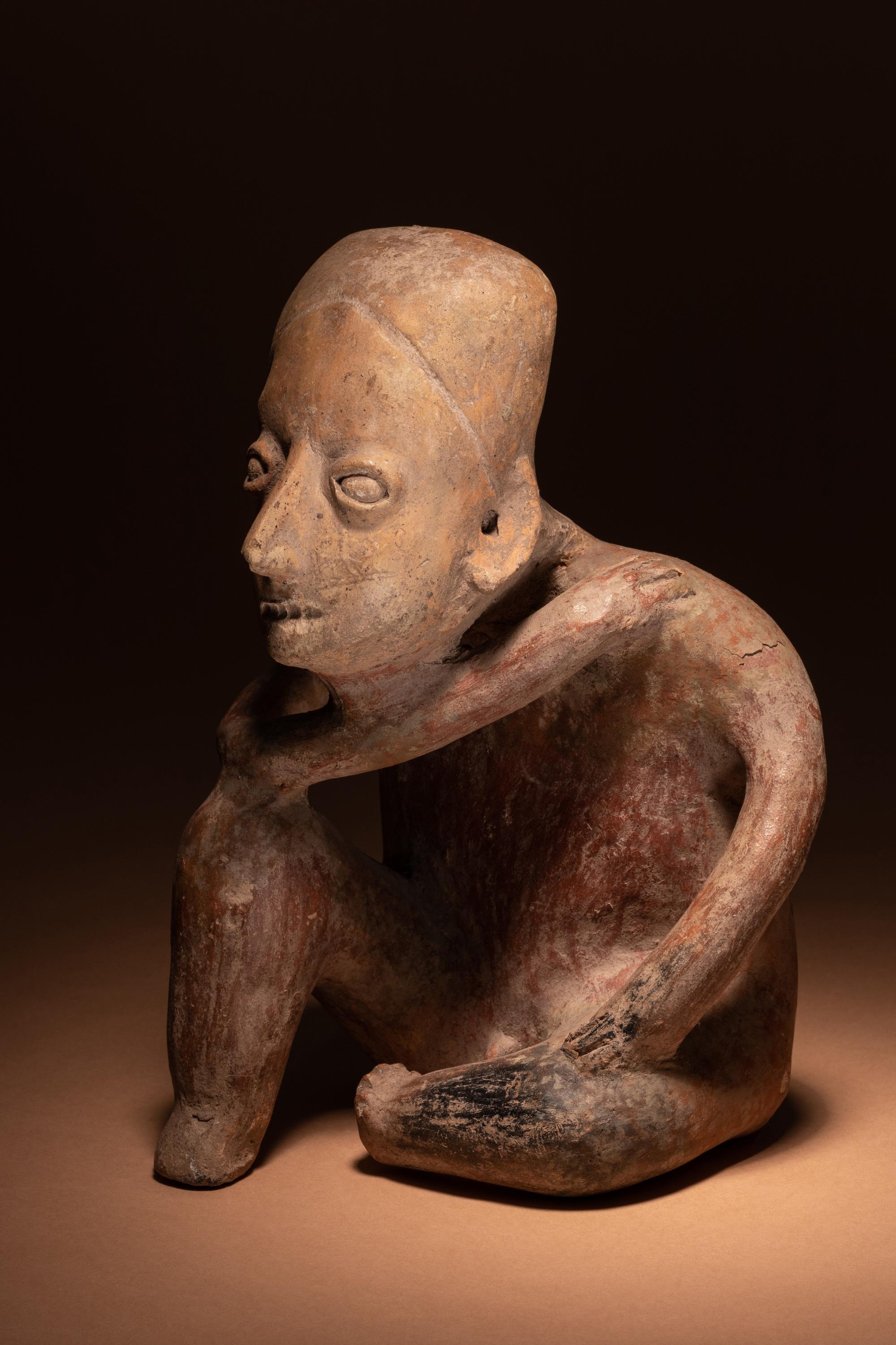 A Colima Terracotta Kneeling Figure