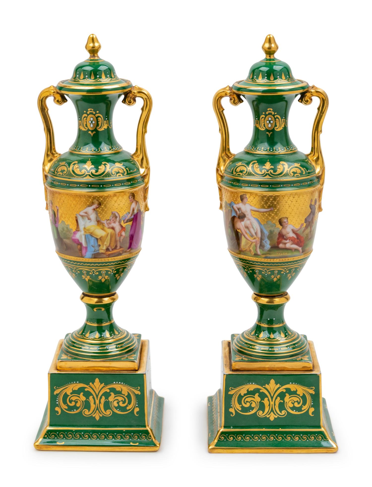 A Pair of Vienna Porcelain Covered Urns on Stands