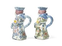 A Pair of Dutch Delft Polychrome Toby Jugs