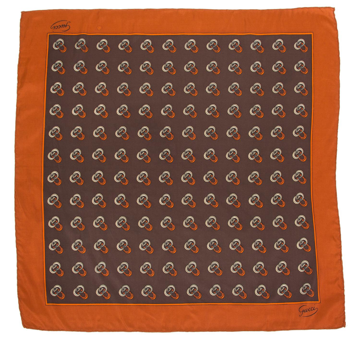 A Pair of Gucci Silk Pocket Squares, 17" x 17"; 22" x 22".