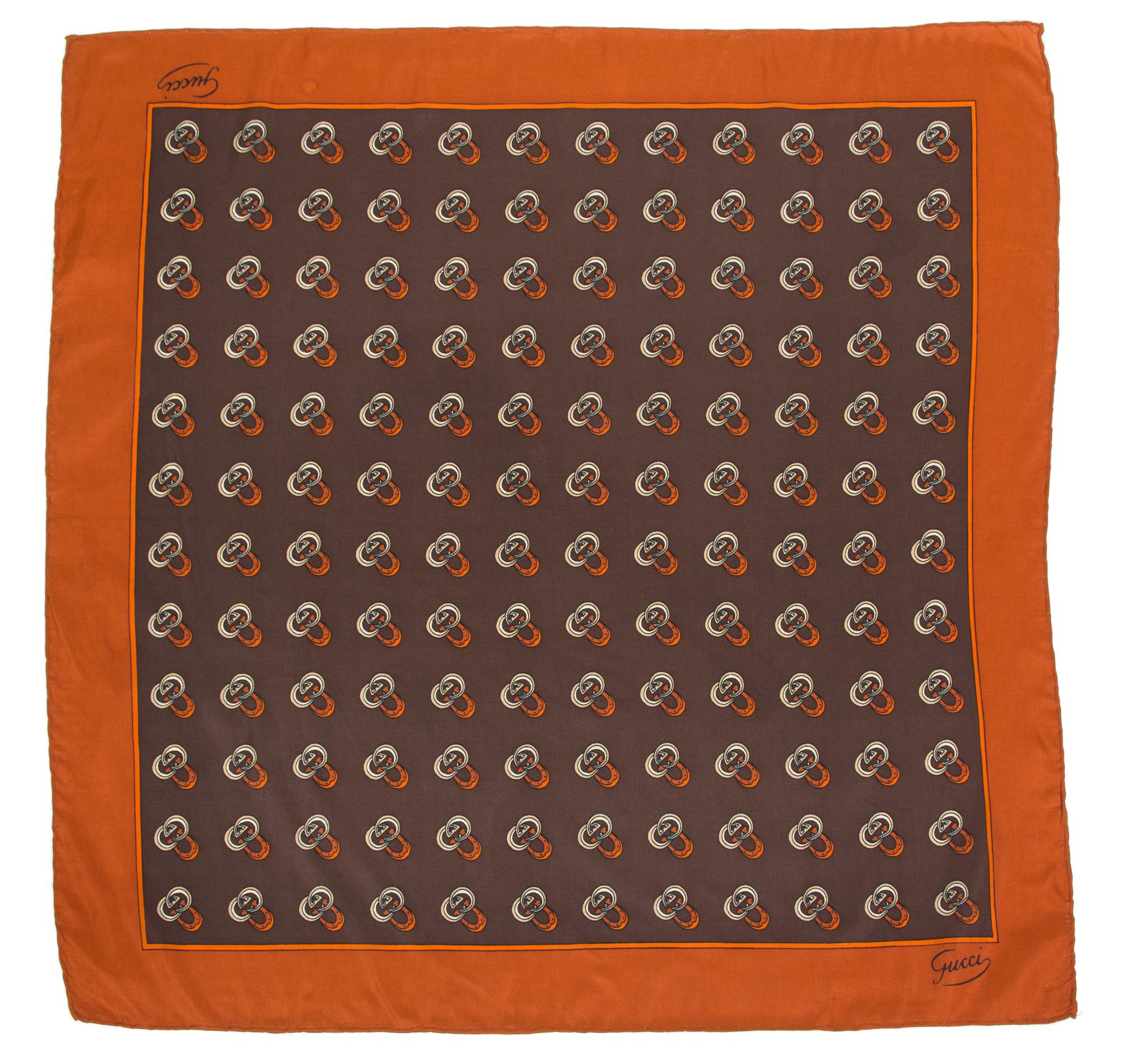 A Pair of Gucci Silk Pocket Squares, 17" x 17"; 22" x 22".