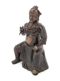 A Chinese Bronze Figure of a Seated Guardian, Guangong