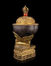 A Tibetan Coral Inset Silver and Gilt Bronze Kapala Bowl