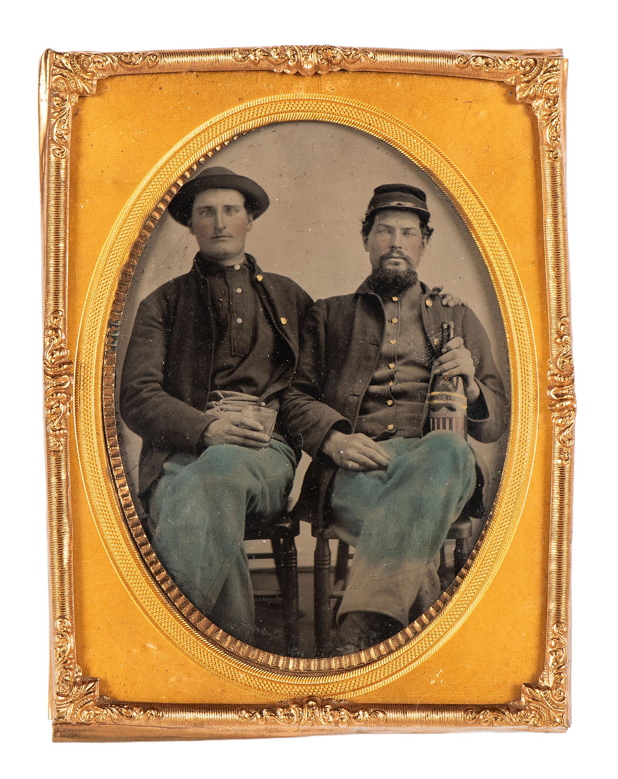 [CIVIL WAR]. Quarter plate tintype of a pair of Union pards sharing a drink.