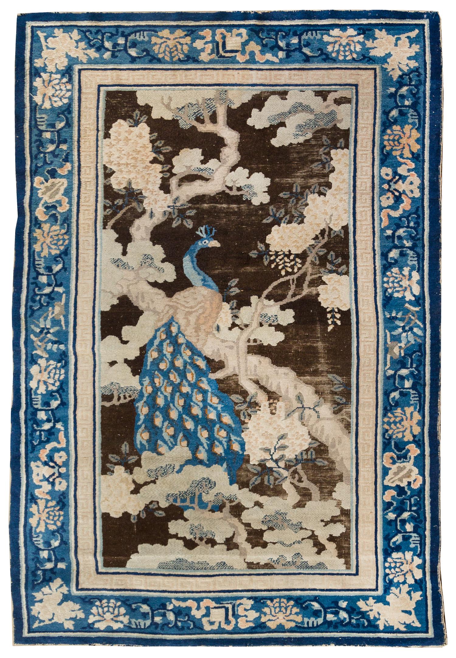 A Chinese Wool Rug 6 feet 9 inches x 4 feet 1 inch. — FIRST HALF, 20TH CENTURY
