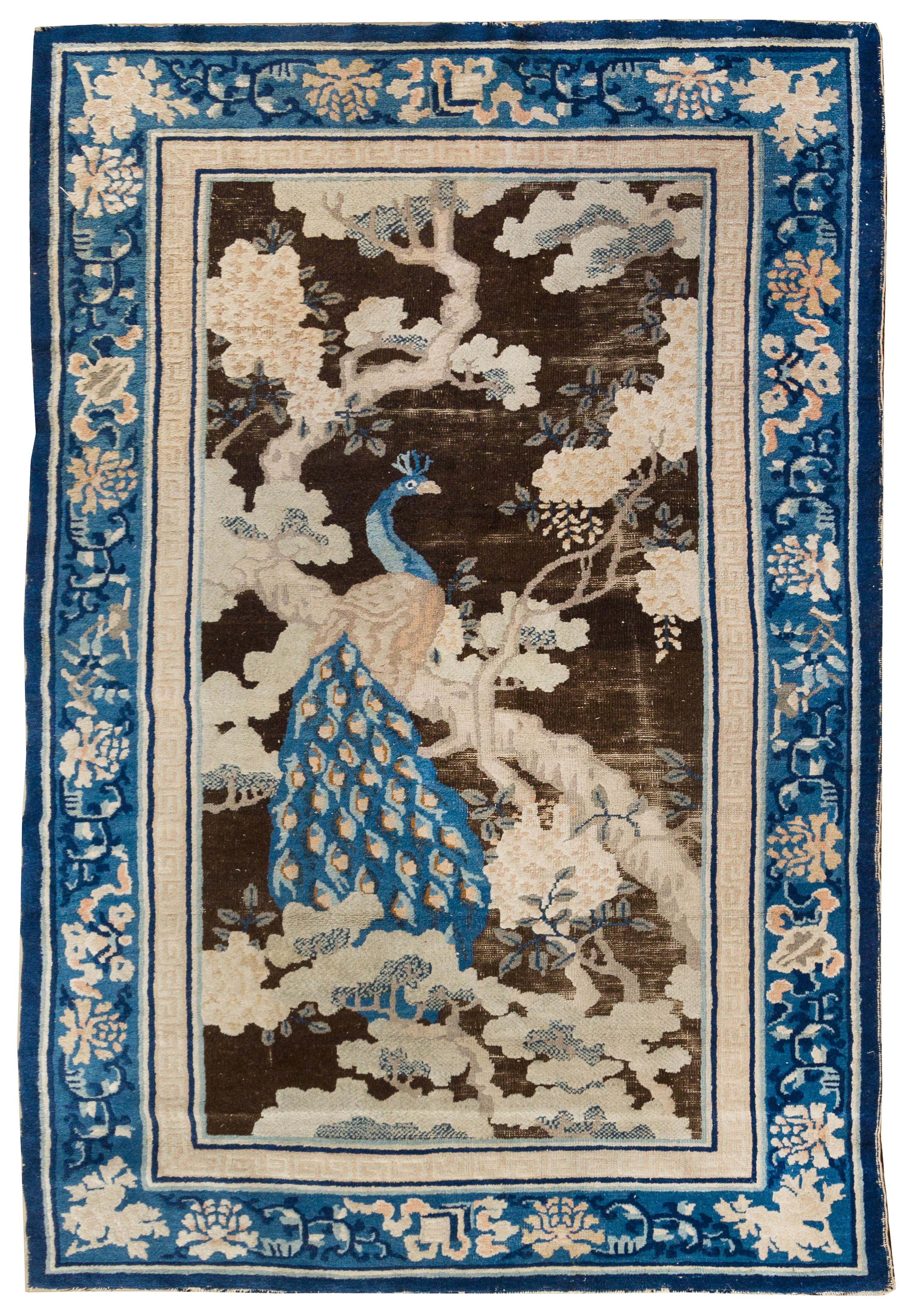 A Chinese Wool Rug 6 feet 9 inches x 4 feet 1 inch. — FIRST HALF, 20TH CENTURY