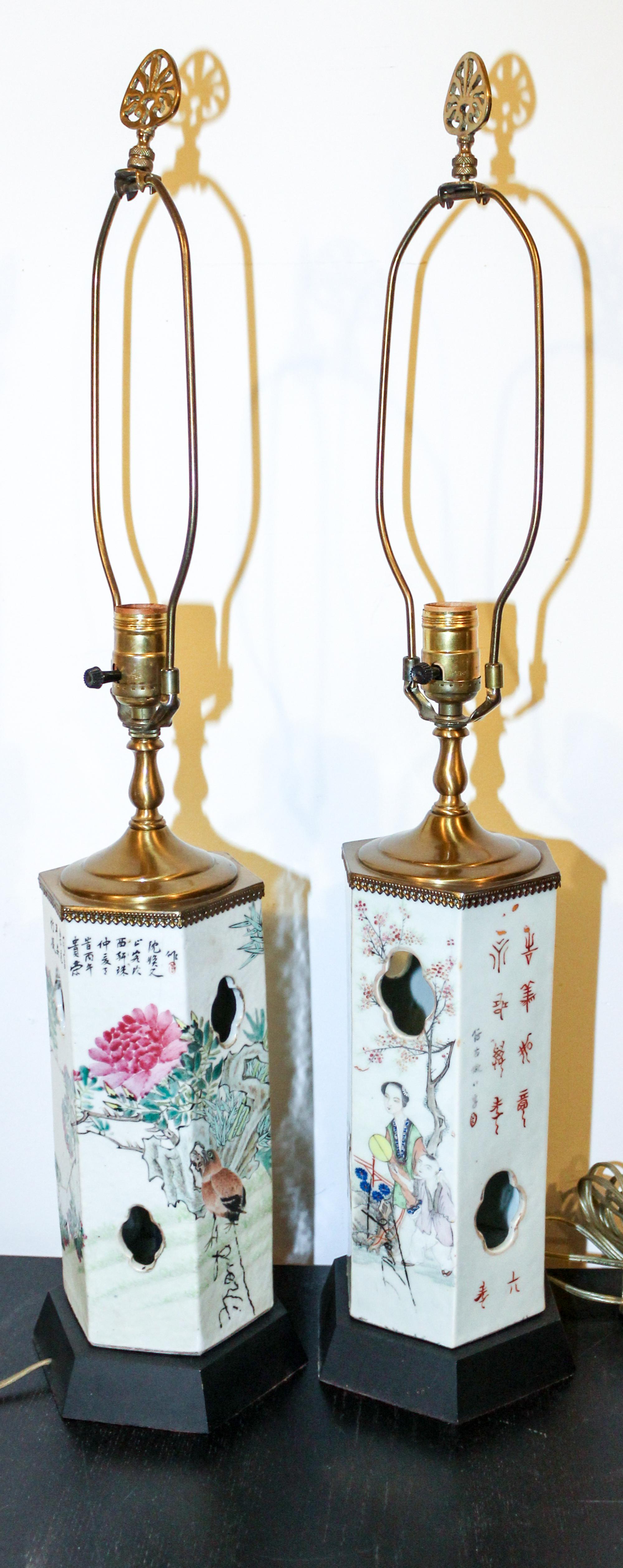 A Pair of Chinese Porcelain Wig Stands Height of porcelain 10 3/4 inches.