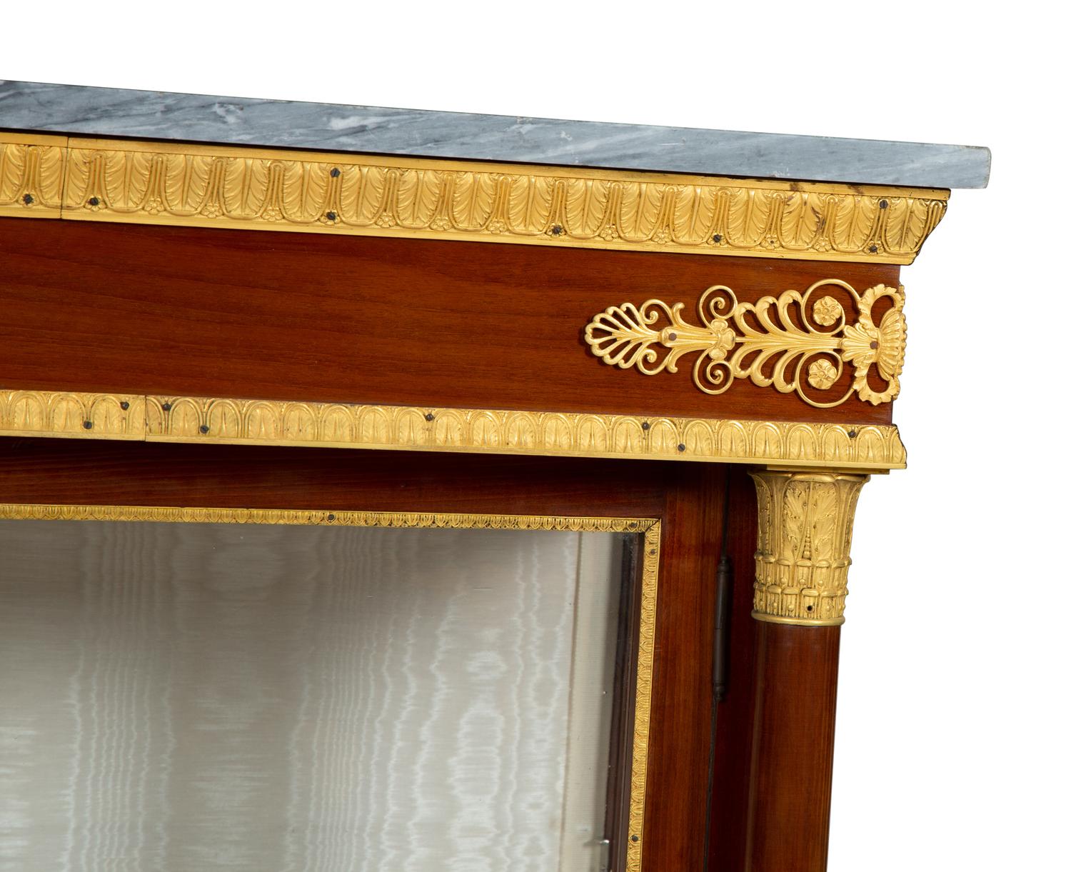 A Pair of Empire Style Gilt Bronze Mounted Mahogany Marble Top Vitrine Cabinets