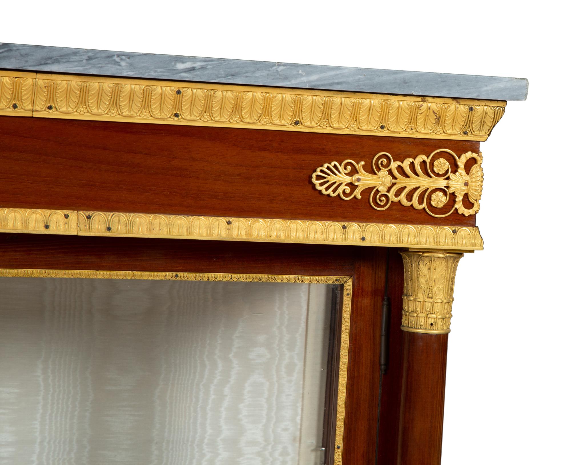 A Pair of Empire Style Gilt Bronze Mounted Mahogany Marble Top Vitrine Cabinets