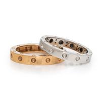 Roberto Coin, Pair of White and Yellow Gold Rings
