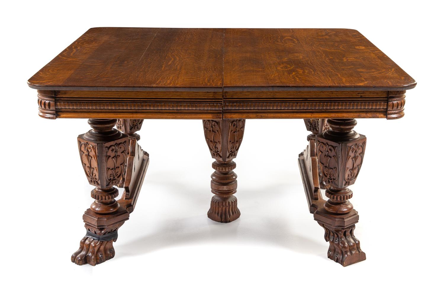A Victorian Renaissance Revival Oak Extension Table Height 27 x width 54 x depth 54 inches. — LATE 19TH CENTURY
