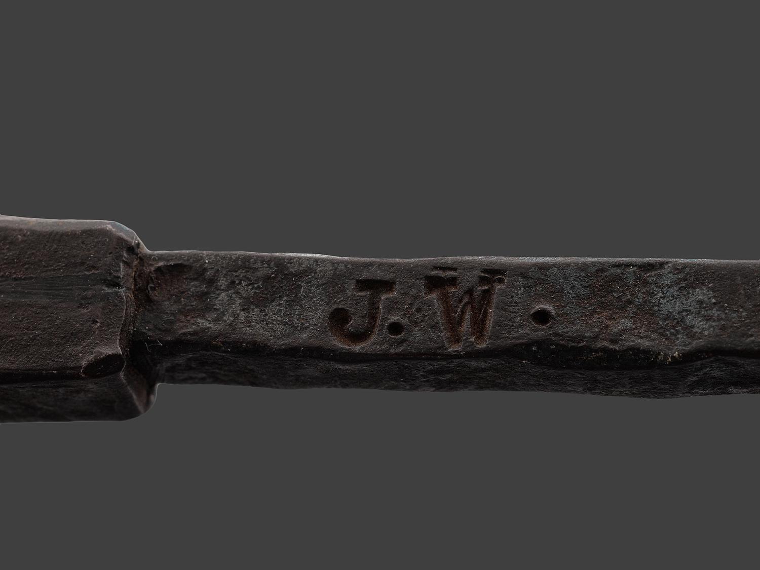 A Forged and Hammered Iron Figural Chestnut Roaster