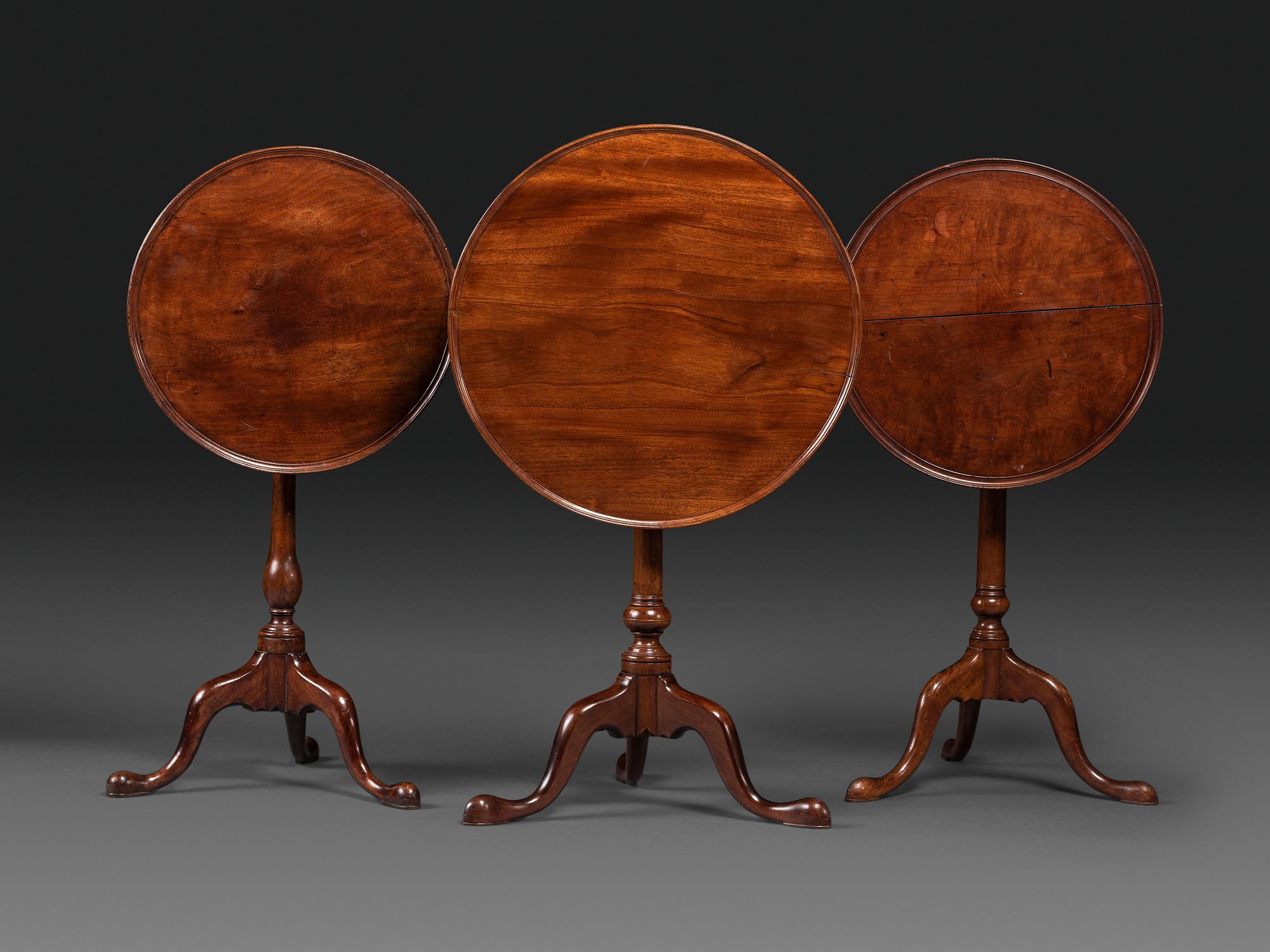 A Chippendale Carved Cherrywood Birdcage-Action Tilt and Dished Top Compressed Ball Tea Table